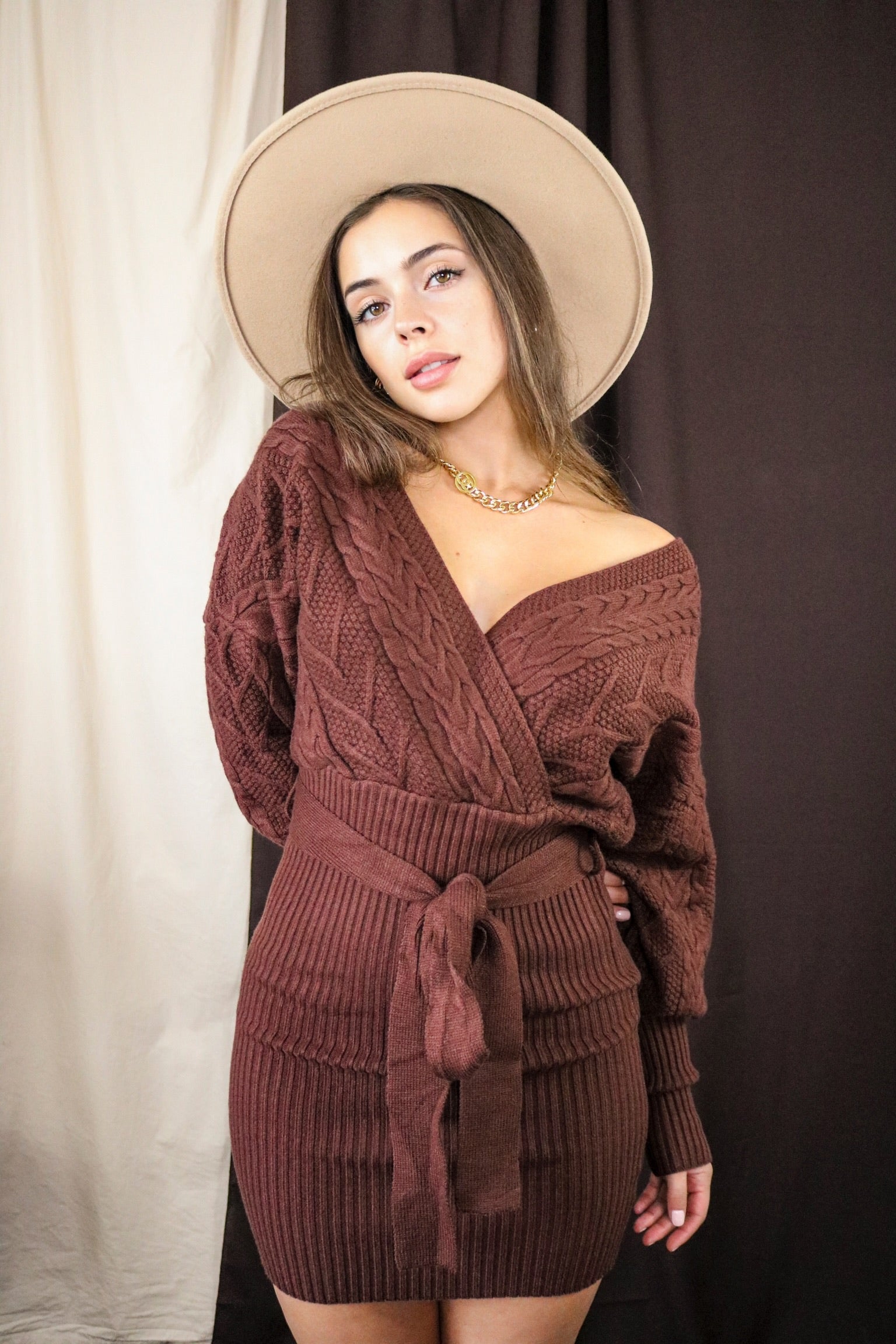 Cable Knit Off The Shoulder Sweater Dress in Cocoa. Ribbed with waist tie. Scarlette The Label, an online fashion boutique and label for women.