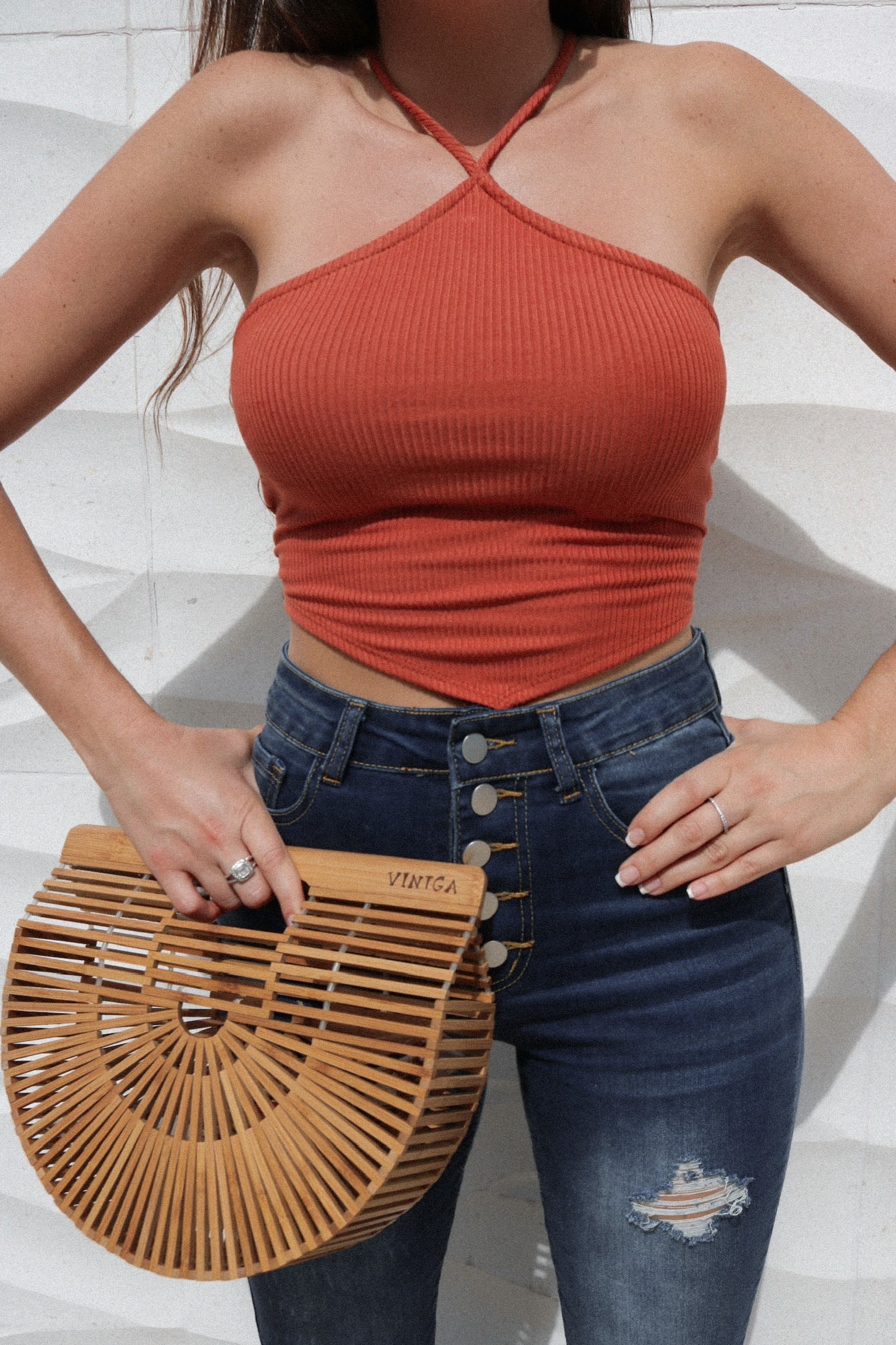Ribbed Halter Top in Terra Cotta with V detail at Scarlette The Label, an online fashion boutique for women. Paired with large wooden bag.