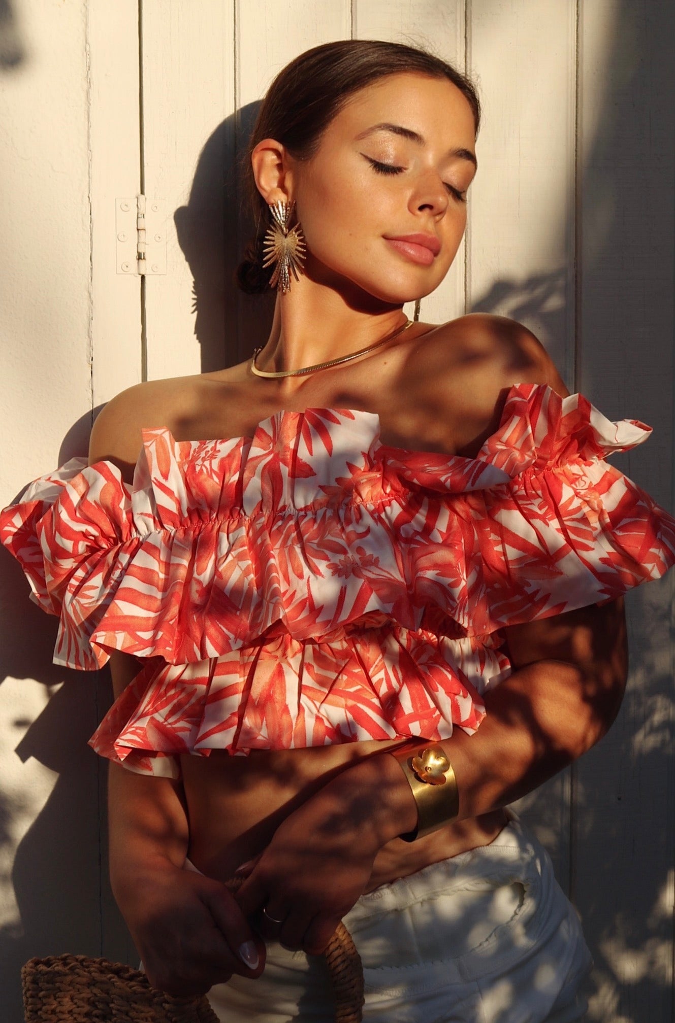 'Ixora' Ruffled Off The Shoulder Vacation Blouse in Coral Print. Scarlette The Label, an online fashion boutique for women.