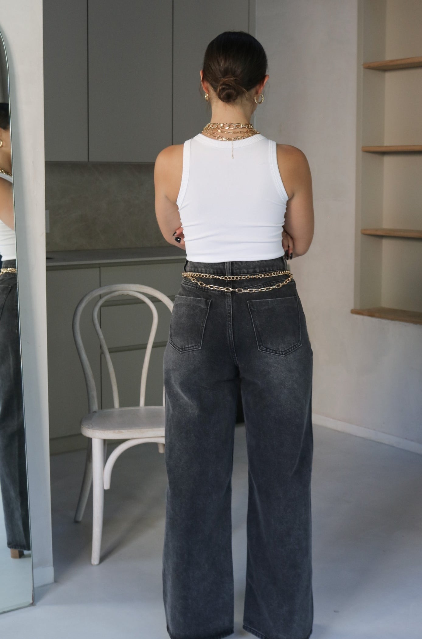High Waisted Wide Fit Washed Denim in Black. Scarlette The Label, an online fashion boutique for women.