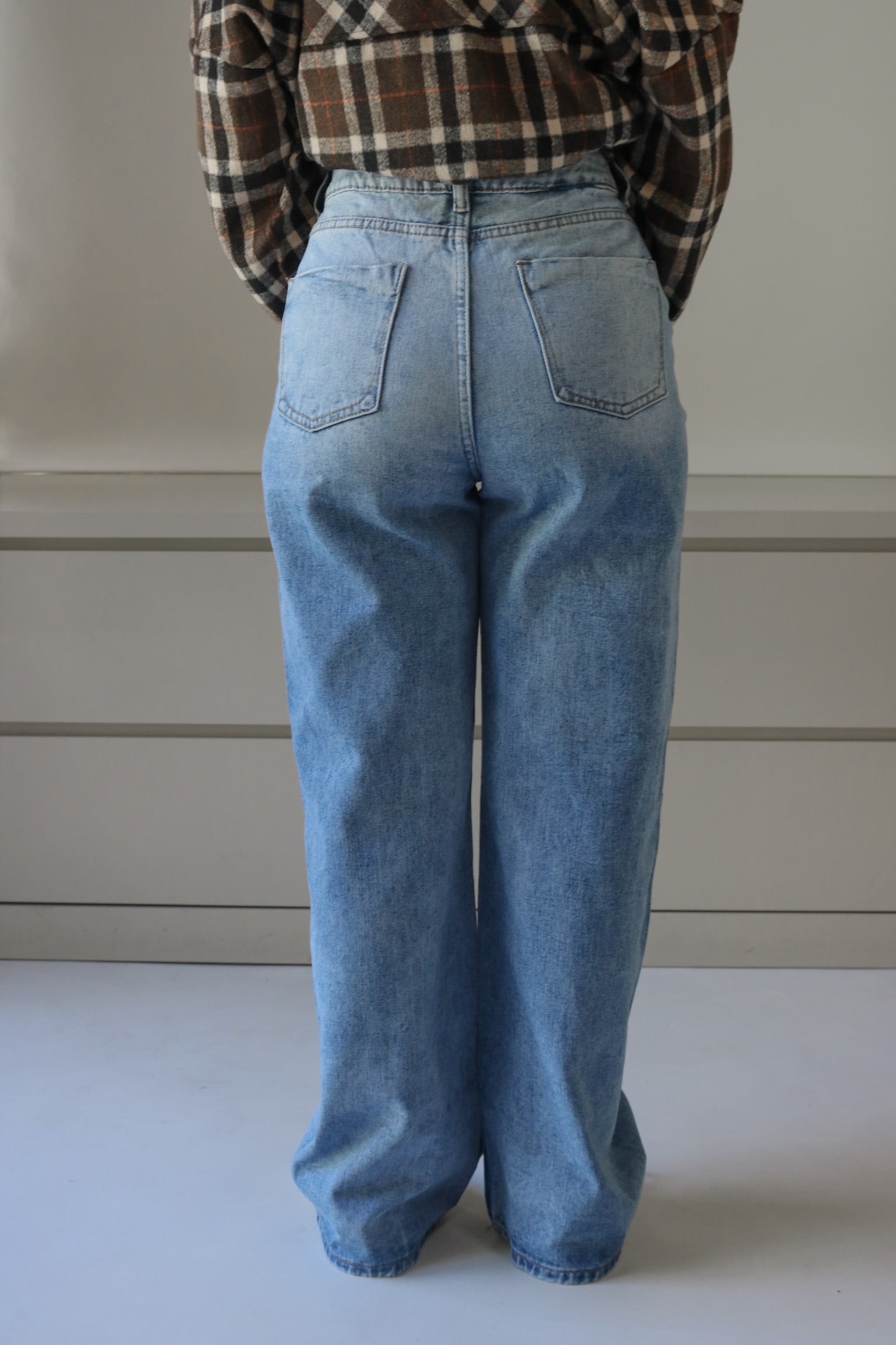 High Waisted Wide Fit Washed Denim. Scarlette The Label, an online fashion boutique for women.
