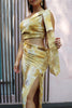 'Anastasia' One Shoulder Cut Out Bow Tie Dress in Gold Print. Scarlette The Label, an online fashion boutique for women.