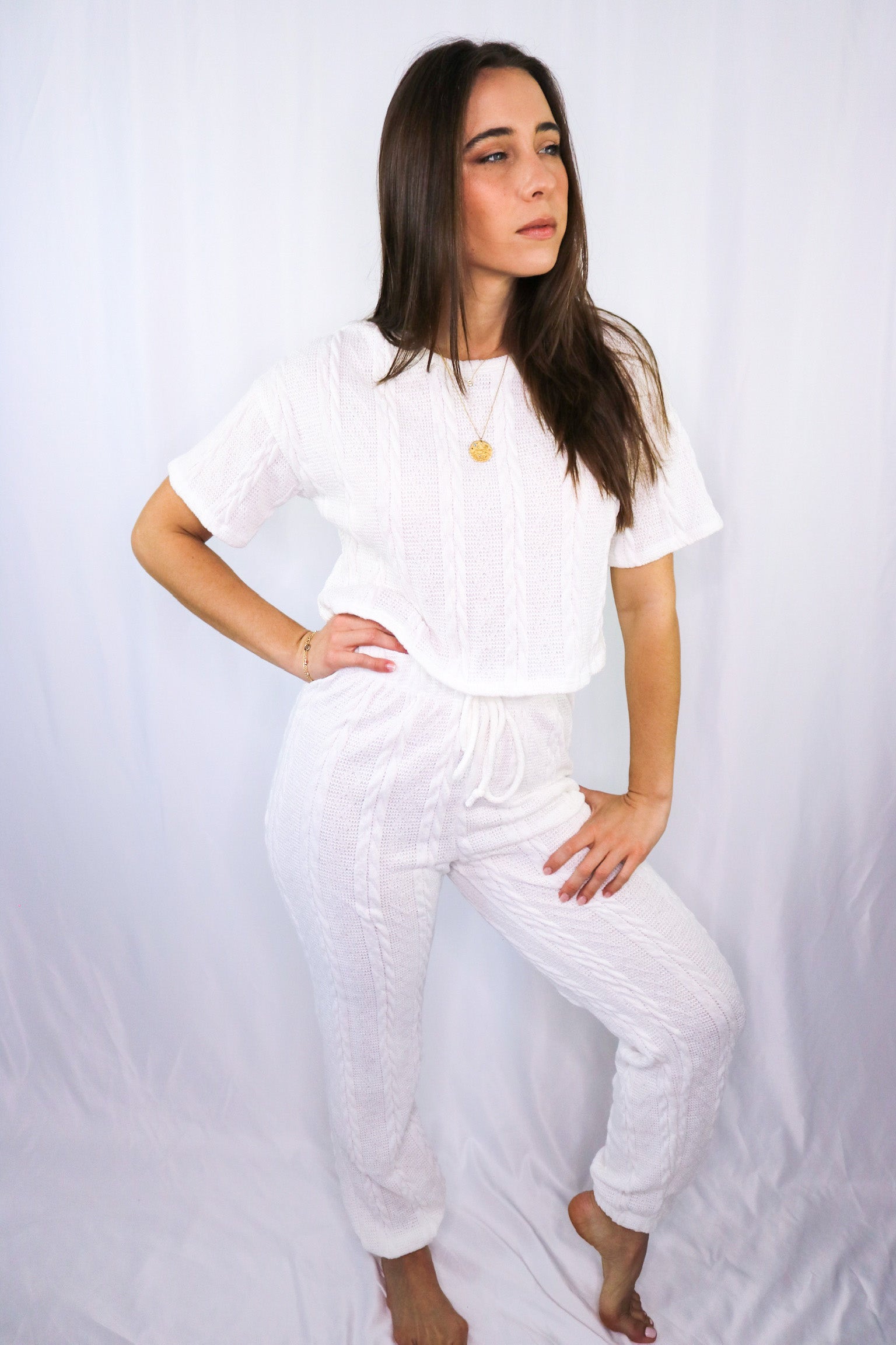 Knitted loungewear set in white (baby tee and matching knitted loungewear pants) for Scarlette The Label, an online fashion boutique for women.