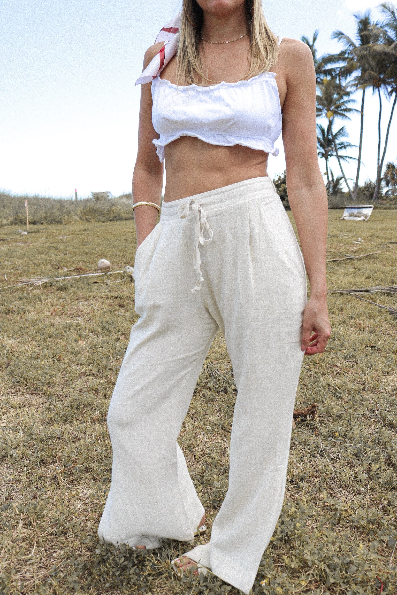 The Sable Wide Leg Linen Pants in Natural sold at Scarlette The Label, an online fashion boutique for women. Resort Wear Collection SS 2021
