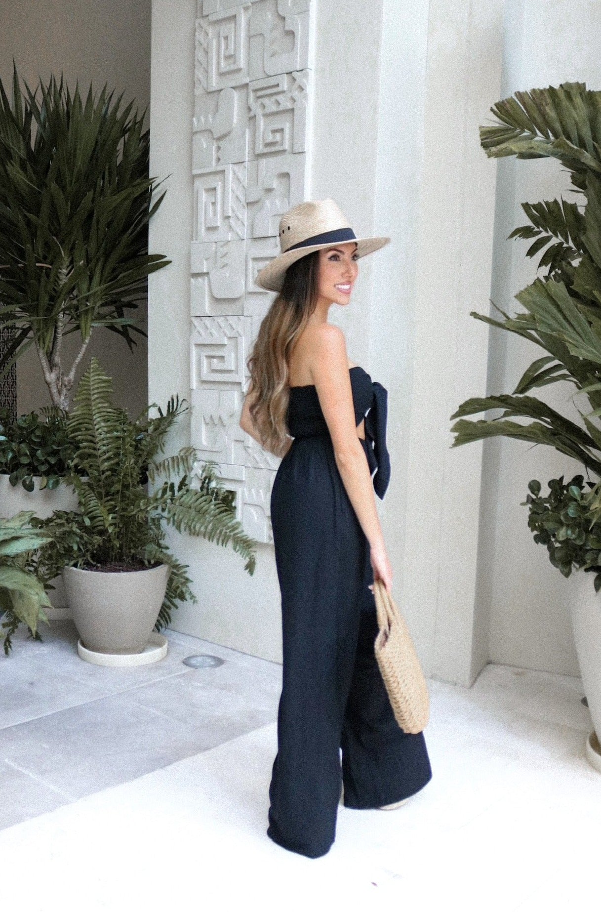 Matching Vacation Pant Set in Black for Scarlette The Label, an online fashion boutique for women. 100% cotton linen tie tube top with matching flare pants and pockets. Staycation Collection SS 2021