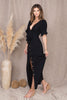 Load image into Gallery viewer, Short Puff Sleeve Buttoned Maxi Dress in Black from Scarlette The Label, an online fashion boutique for women. Paired with black purse, black sunglasses and leopard print heels boots.