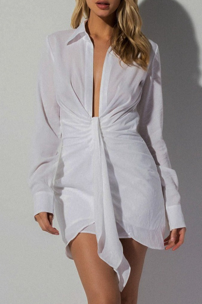 The Mallorca Collared Plunge Tie Dress in White from Scarlette The Label, an online fashion boutique for women. Plunging neckline dress in white. Resort Wear Collection SS 2021