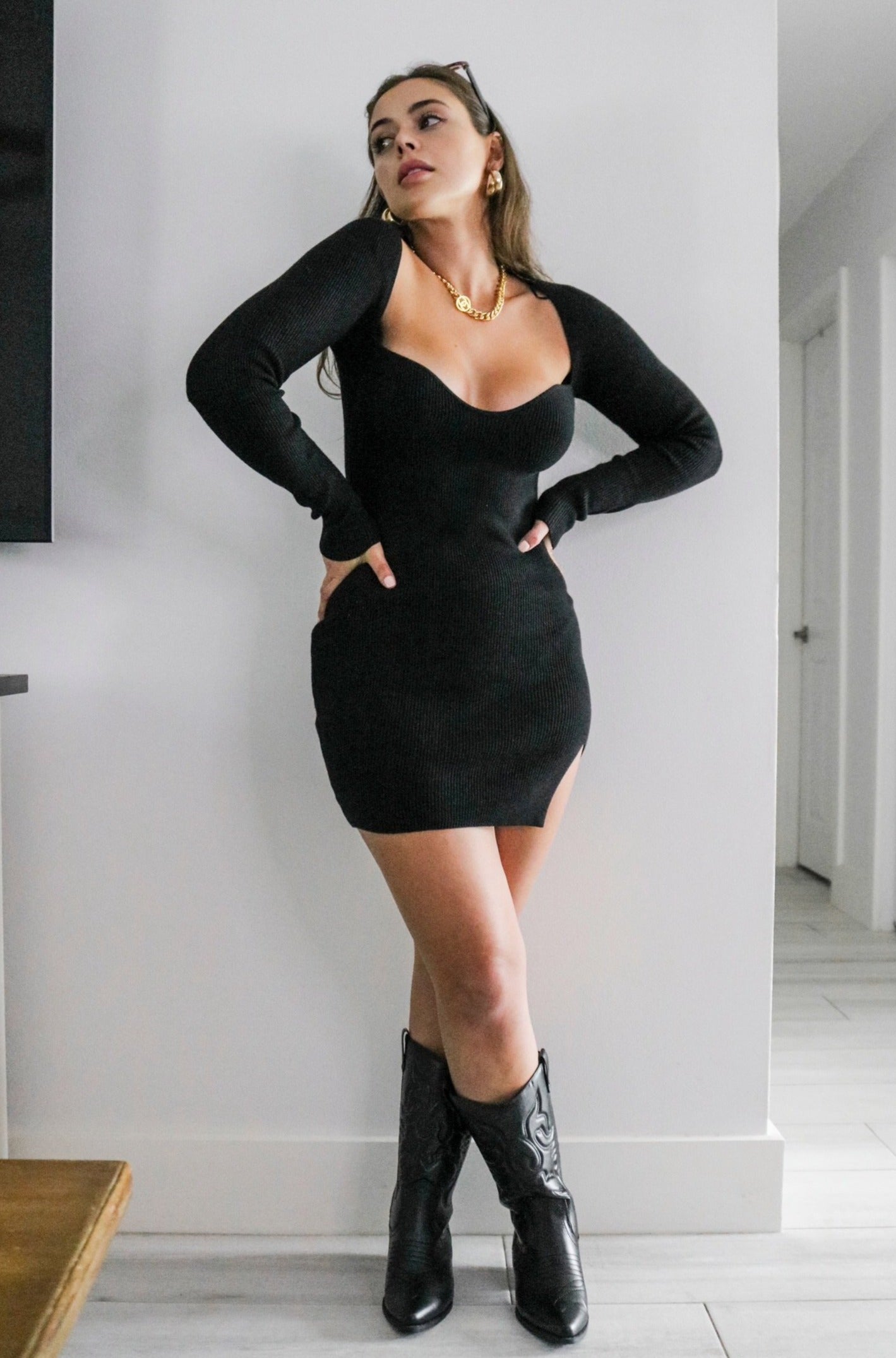 Ribbed Sweater Mini Dress in Black. Scarlette THe Label, an online fashion boutique and label for women.