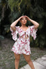 Flare Sleeve Cut Out Romper in Wine Floral for Scarlette The Label, an online fashion boutique for women.