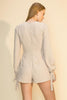 Short Asymmetrical Skort Romper in Sand with slit sleeves from Scarlette The Label, an online fashion boutique for women.