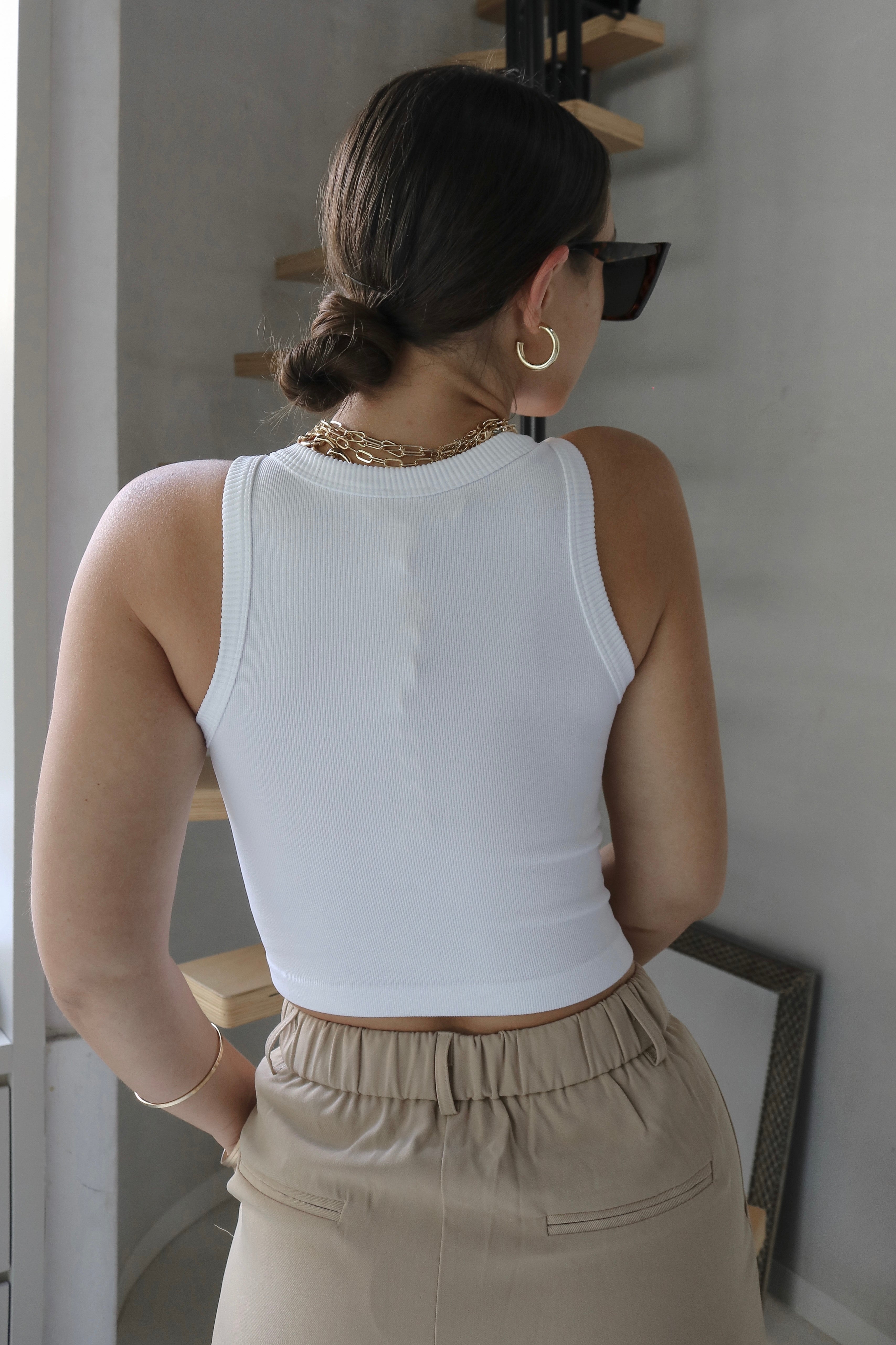 Ribbed Muscle Tank Top in White. Scarlette The Label, an online fashion boutique for women.