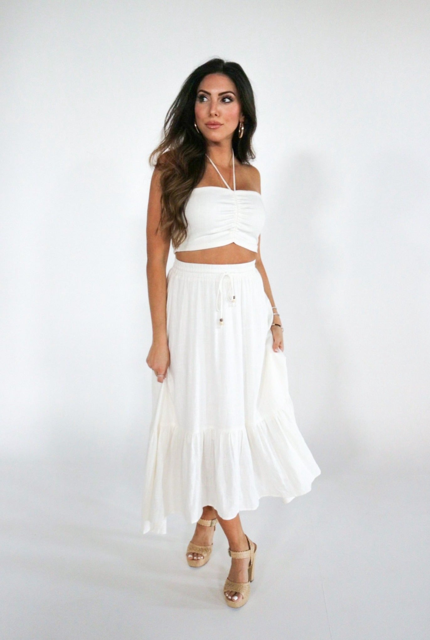 Matching Halter and Circle Skirt Set in Ivory with Ruched and Ruffle Detail. The Color Coded Collection. Scarlette The Label, an online fashion boutique for women.