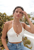 Criss Crop Crop Top Tank in Ivory from Scarlette The Label, an online fashion boutique for women. Paired with light wash denim jeans and gold hoops.