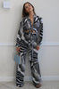 Wide Leg Pant Set in Black and White Multi Print w/ Matching Tie Top in Black and White Zebra Print. Scarlette The Label, an online fashion boutique for women.