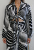 Wide Leg Pant Set in Black and White Multi Print w/ Matching Tie Top in Black and White Zebra Print. Scarlette The Label, an online fashion boutique for women.