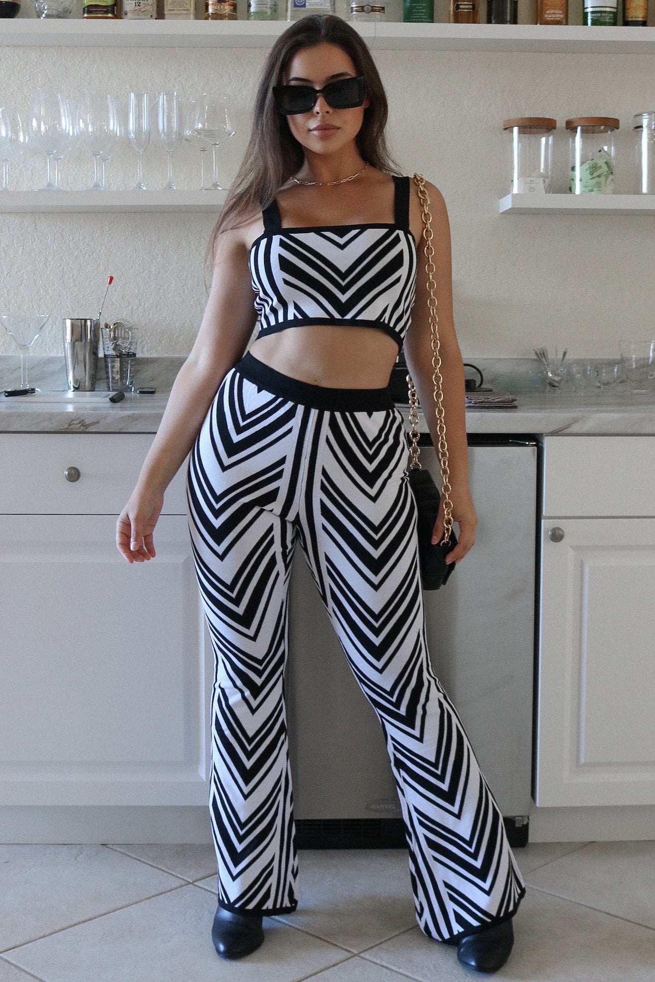 Woven Striped Boot Cut Pant Set with Matching Tube Tank Top in Black and White. Scarlette The Label, an online fashion boutique for women.